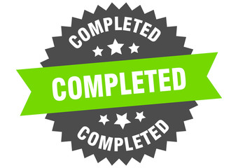 completed sign. completed green-black circular band label