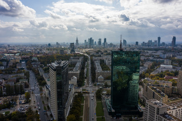 Aerial view of a cityscape with a view of skyscrapers and buildings in Warsaw. Poland. 06. October. 2019 Drone shot between two skyscrapers towards the city center.
