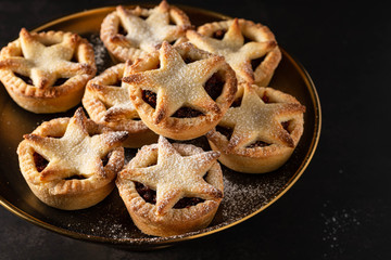 British Christmas mince pies on dark background. © Natallia