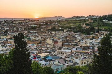 Fototapeta na wymiar Panoramic scenic view of the city of Medina Fes in Morocco at sunset