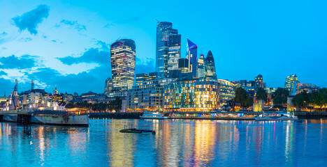 Skyline of London with the Thames River at sunset - United Kingdom