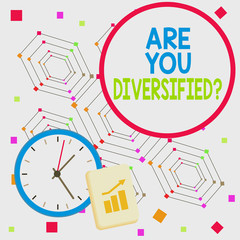 Fototapeta premium Handwriting text Are You Diversified Question. Conceptual photo someone who is Different Mixed Multi Faceted Layout Wall Clock Notepad with Escalating Bar Graph and Arrow Pointing Up