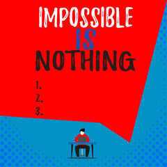 Text sign showing Impossible Is Nothing. Business photo showcasing Anything is Possible Believe the Realm of Possibility View young man sitting chair desk working open laptop geometric background