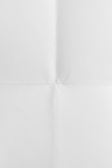 White paper folded in four, texture background