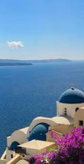 Greece santorini view with blue dome church. Mediterranean white and blue summer landscape.