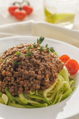 Bolognese sauce with zucchini spaghetti.