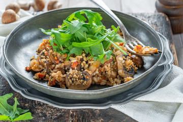 Mushroom, chorizo and thyme risotto with rocket lettuce