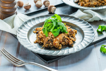 Mushroom, chorizo and thyme risotto with rocket lettuce