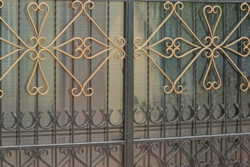 brown wrought iron metal texture on gray metal wall