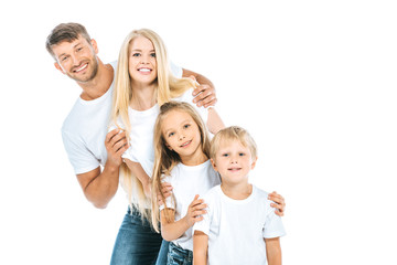 positive family in white t-shirts isolated on white