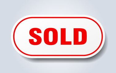 sold sign. sold rounded red sticker. sold