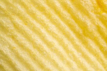 Potato chip texture background closeup