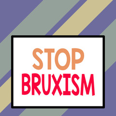 Text sign showing Stop Bruxism. Business photo text put an end to a condition which you grind or clench the teeth Front close up view big blank rectangle abstract geometrical background