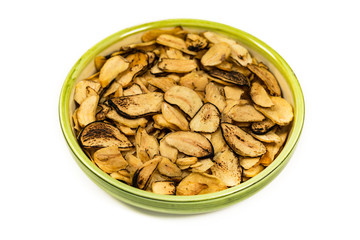 Roasted Garlic Slices Isolated on a white background. Selective focus.