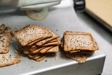 The process of making bread grain crackers in a small bakery