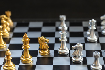 Chess game, set the board waiting to play in both gold and silver pieces blur6