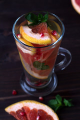 healthy eating. fresh red cocktail with ripe grapefruit and orange. detox water. diet healthy eating and weight loss concept. top view