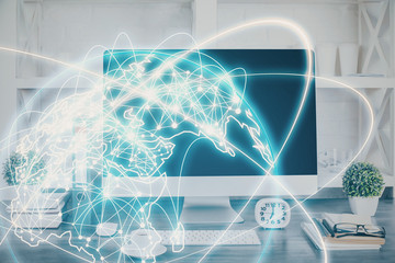 Double exposure of business theme icons and work space with computer background. Concept of success.