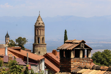 Obraz premium Escape Larger Cities Like Tbilisi and Batumi and Discover Georgian Culture, Ancient Towers, Landmarks, Fortresses, Buildings In a Small Town Signagi. Enjoy Views in Kakheti and Enjoy Georgian Summer!