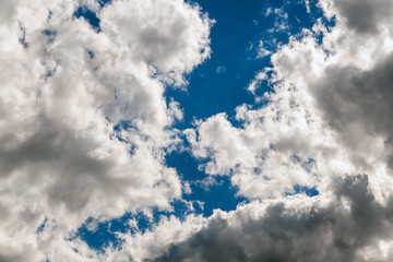 Obraz premium Cloud background. Clouds with a piece of blue sky.