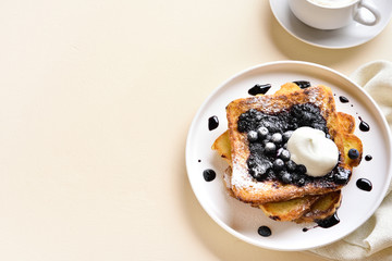 French toasts with blueberry sauce