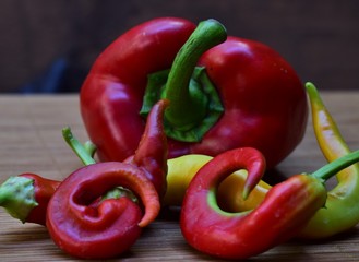 red peppers on wooden background