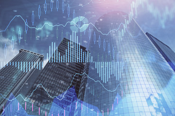 Forex chart on cityscape with skyscrapers wallpaper multi exposure. Financial research concept.