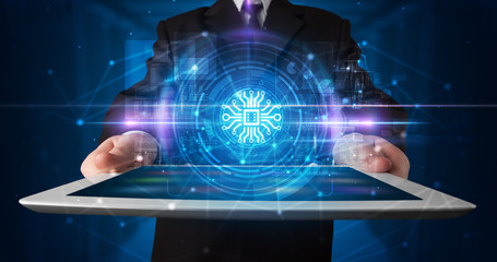 Hand holding tablet with online security and data protection concept