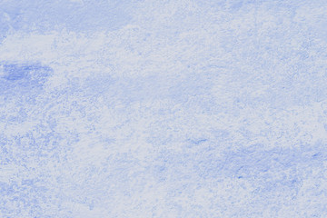 Wall painted in light blue as texture and background for design.  