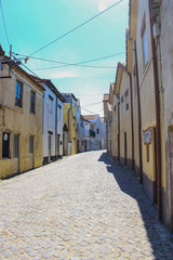 View on the beautiful old small buildings with portuguese tiles on the facades in the town of Vila Cha, Portugal