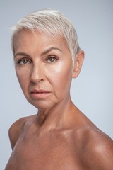 Close up of a beautiful lady looking into camera