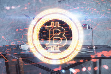 Double exposure of blockchain and crypto economy theme hologram and table with computer background....
