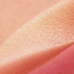 Fototapeta premium White pink artificial foam, soft texture on a light background.