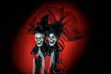 Bride and groom skull wedding dresses symbol of the day of the dead and hallowed, typical american...