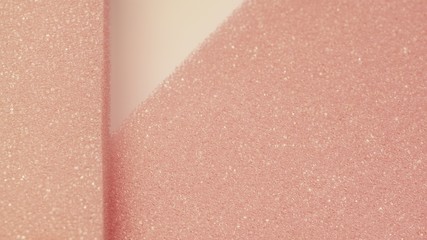 White pink artificial foam, soft texture on a light background.