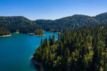 Fototapeta premium Aerial panoramic view of Lokvarsko Lake, beautiful mountain landscape on sunny summer day, Lokve, Gorski kotar, Croatia