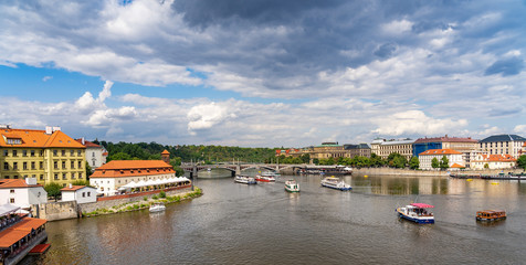 Fototapeta na wymiar Scenic panorama cityscape view of Moldava river boat Prague in Czech Republic.