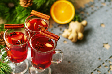 Christmas mulled red wine with spices, oranges and cinnamon. Hot, delicious drink. 
