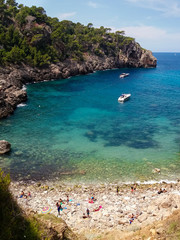 Fototapeta premium Cala de Deia in Mallorca, most beautiful beach in the world 