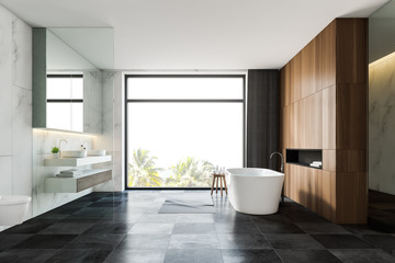 White marble and wooden bathroom with toilet