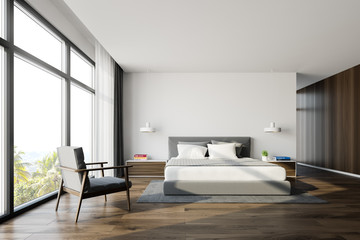 Naklejka na ściany i meble Panoramic king size bedroom interior, armchair