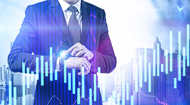Businessman with smartwatch, forex graph