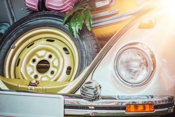 Opened car trunk full of suitcases in sunlight. Travel concept.