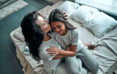 Mom and daughter in the bedroom