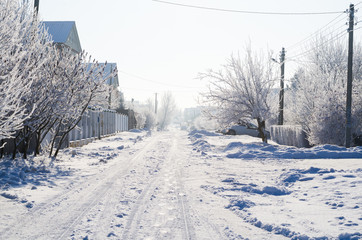 picturesque snow-covered road in the countryside in winter