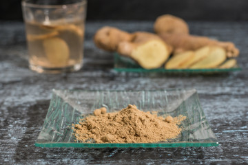 Ginger powder, infusion and cut root