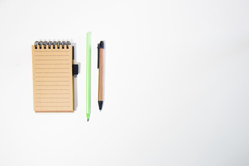 Brown notebook in white background