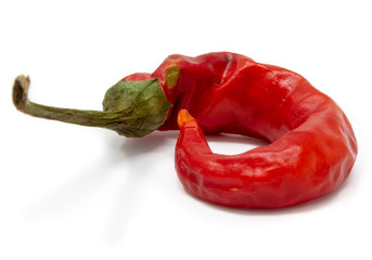 red chili pepper on a white background macro photography