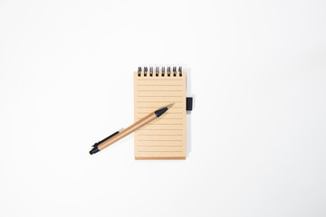 Brown notebook in white background