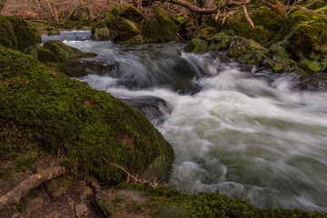 Waterfall in the forest in autumn